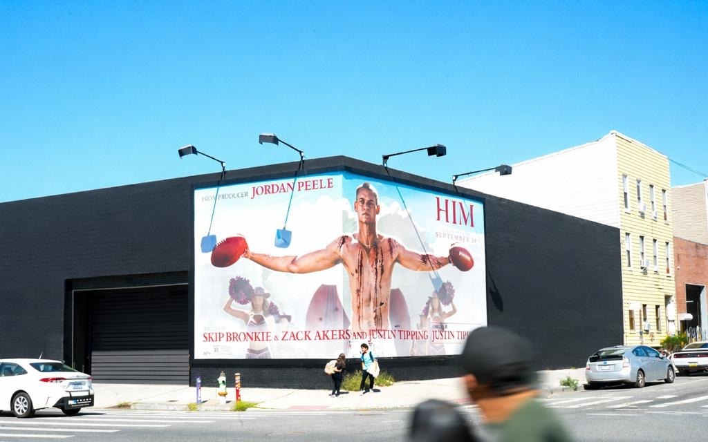 Large wallscape advertisement on a building facade
